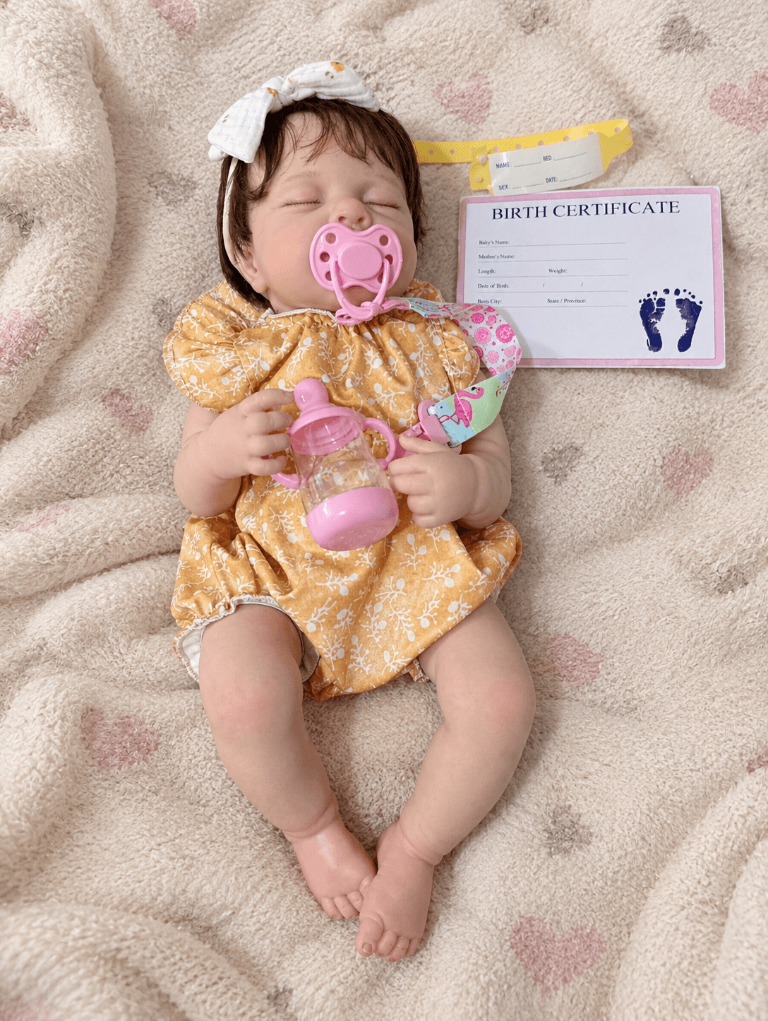 Muñeca bebé reborn realista de ojos cerrados